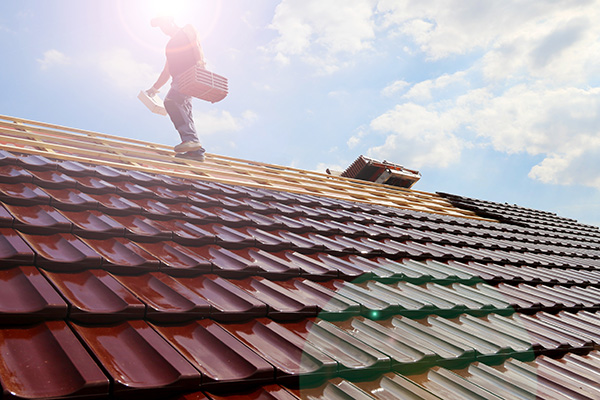 Roofer walking on roof in Hemel Hempstead