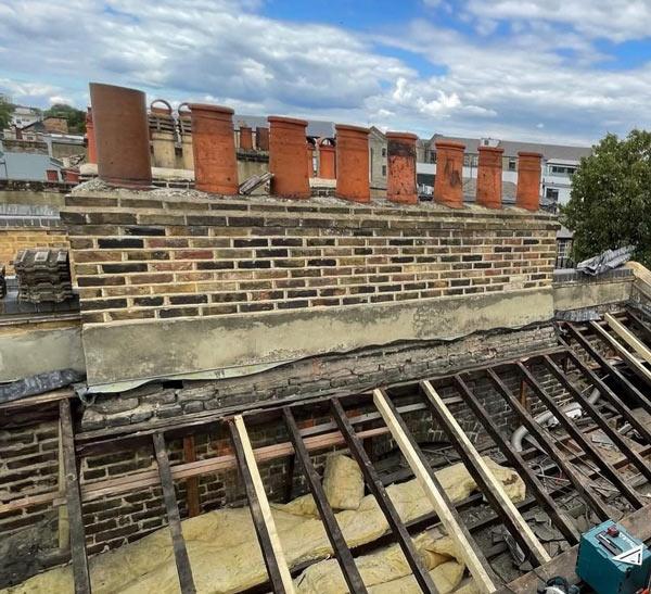 Chimney and roof repair in progress